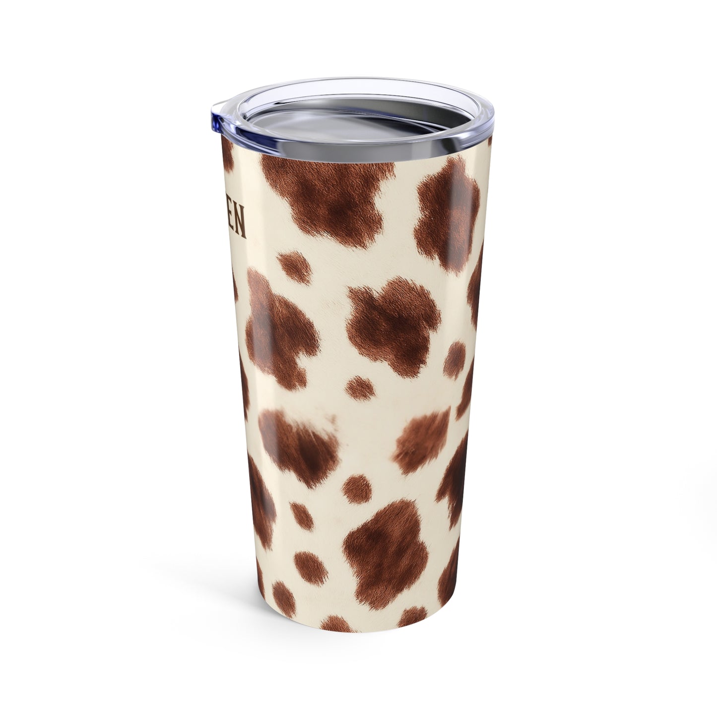 Tumbler with cow print design on a white background