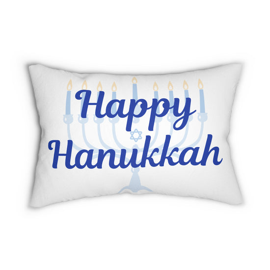 White pillow with 'Happy Hanukkah' text and menorah design on a white background
