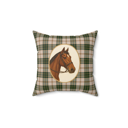 Decorative pillow with a plaid pattern and horse illustration on a white background