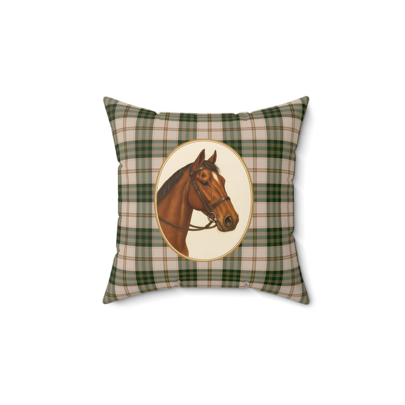 Decorative pillow with a plaid pattern and horse illustration on a white background