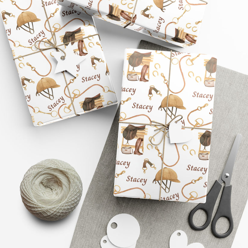 Personalized equestrian wrapping paper featuring watercolor saddles, boots, and bridles, printed on satin-finish paper from Trésor Valeur’s Modern Equestrian Collection