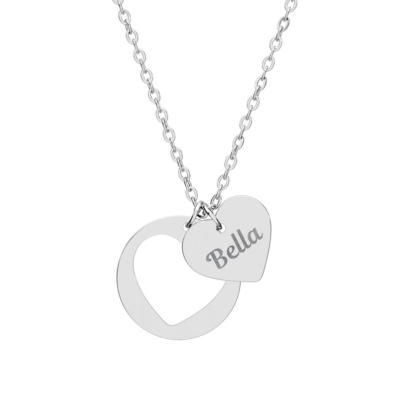 Silver necklace with a heart-shaped pendant and engraved name on a white background