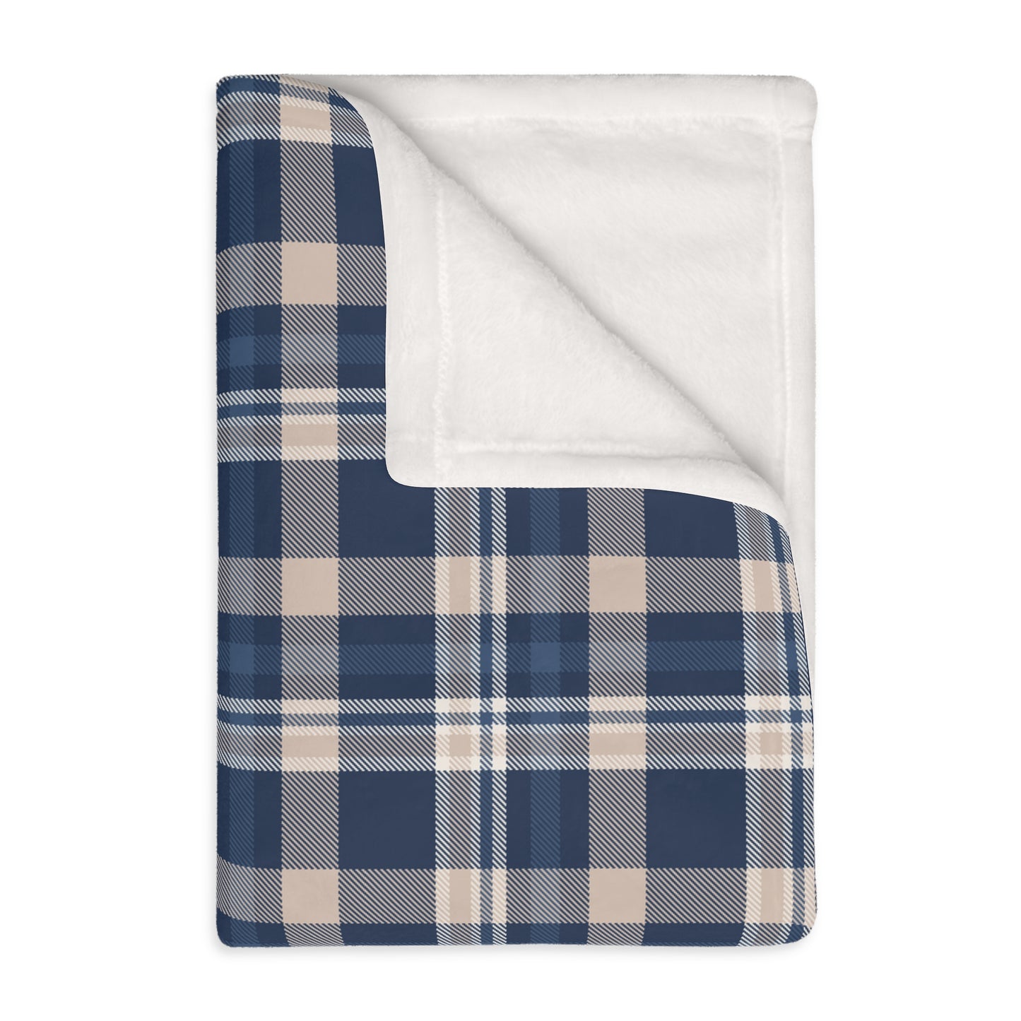Blue and beige plaid blanket with white backing on a white background