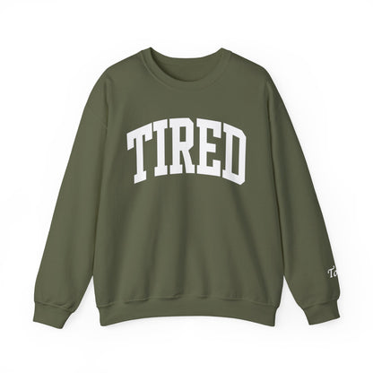 Green sweatshirt with 'TIRED' text on a white background