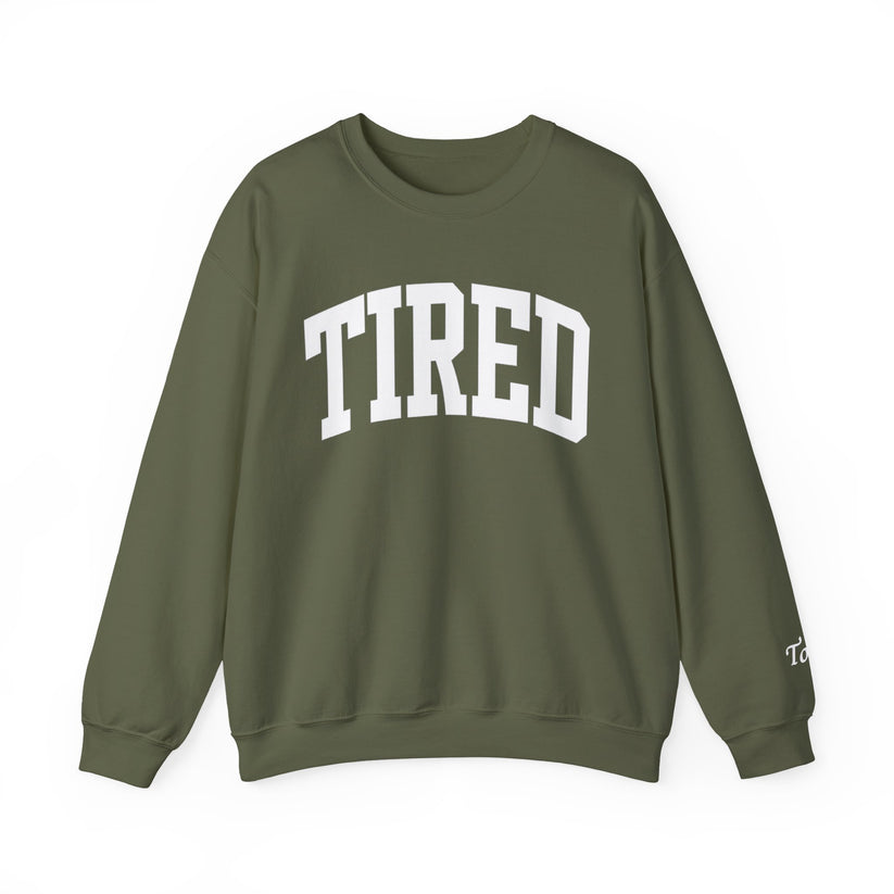 Green sweatshirt with 'TIRED' text on a white background