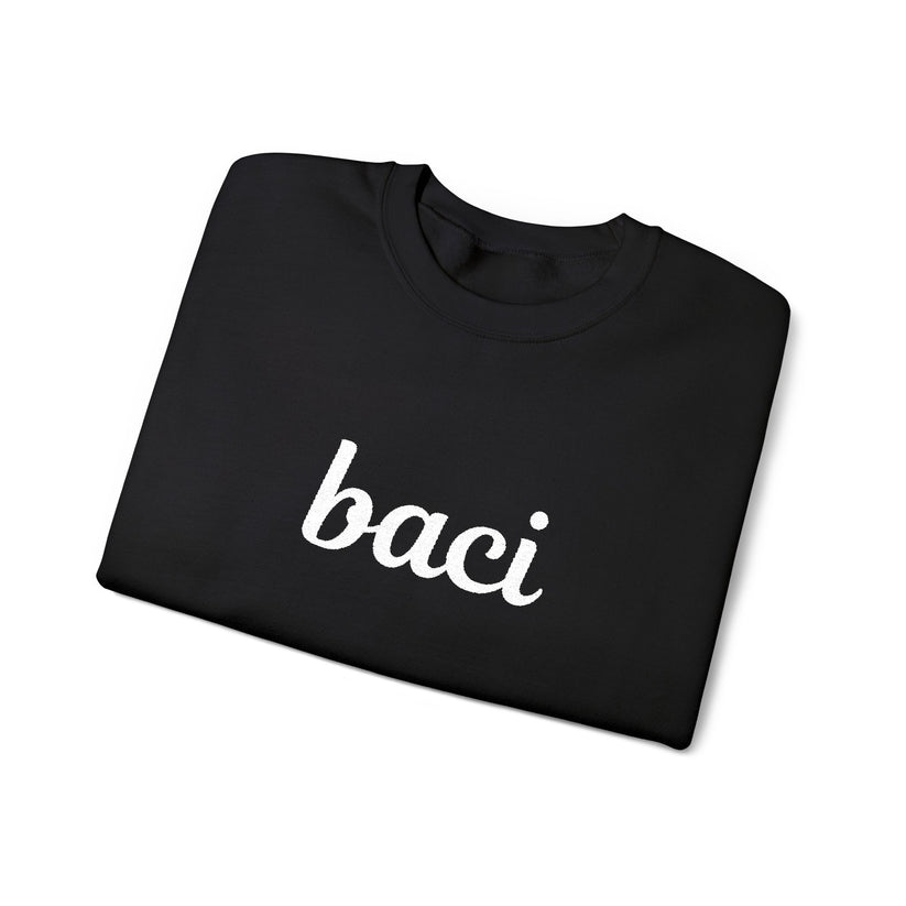 Black folded sweatshirt with white embroidered word "baci".