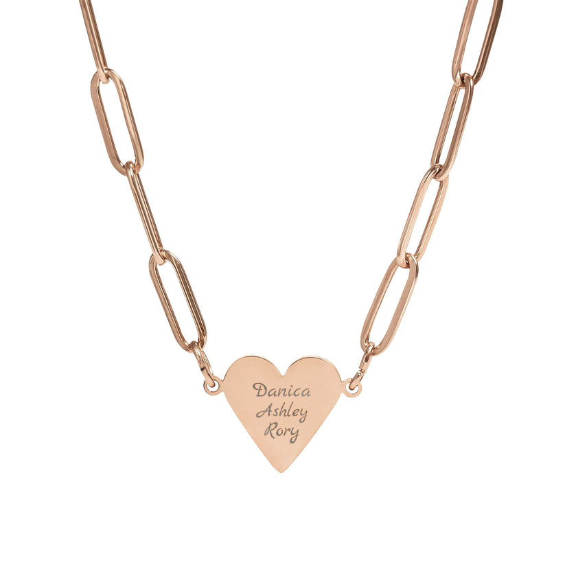 Rose gold necklace with a heart-shaped pendant on a white background