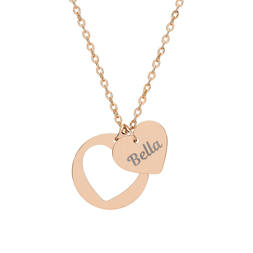 Rose gold necklace with a heart-shaped pendant and 'Bella' engraving on a white background