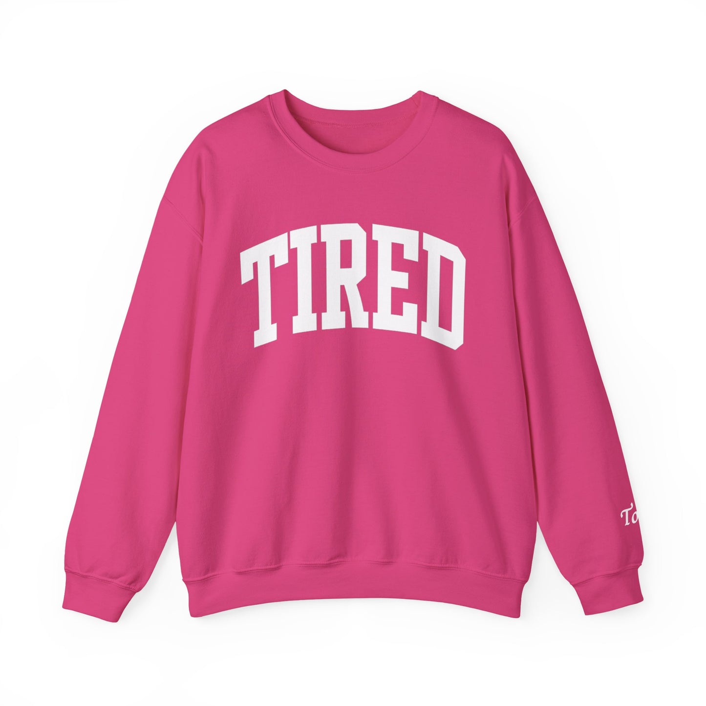 Pink sweatshirt with 'TIRED' text on a white background