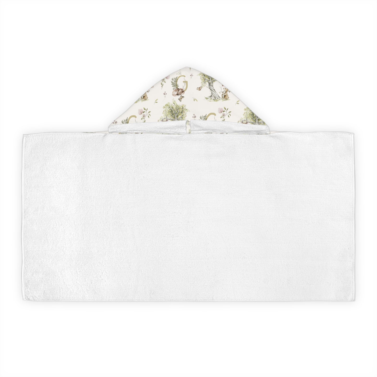 Patterned hooded towel with watercolor mice and bunnies and a monogrammed initial in a bathroom