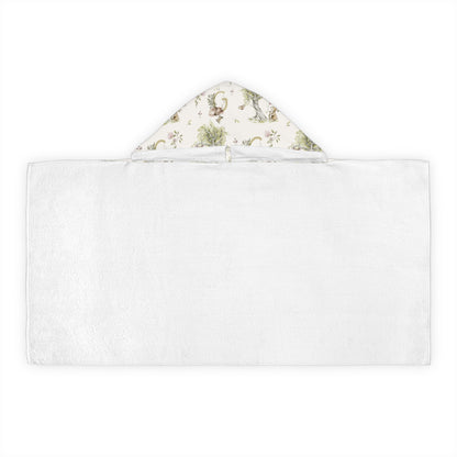 Patterned hooded towel with watercolor mice and bunnies and a monogrammed initial in a bathroom
