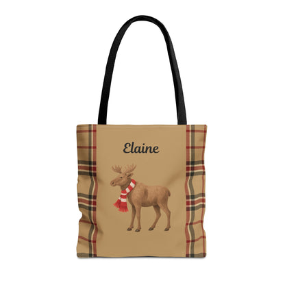 Tote bag with moose design and plaid pattern on a beige background