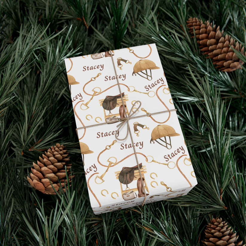Personalized equestrian wrapping paper featuring watercolor saddles, boots, and bridles, printed on satin-finish paper from Trésor Valeur’s Modern Equestrian Collection