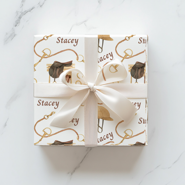 Personalized equestrian wrapping paper featuring watercolor saddles, boots, and bridles, printed on satin-finish paper from Trésor Valeur’s Modern Equestrian Collection