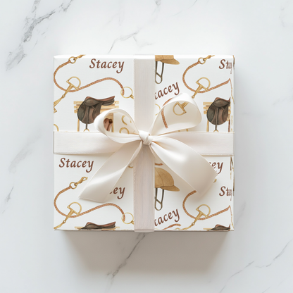 Personalized equestrian wrapping paper featuring watercolor saddles, boots, and bridles, printed on satin-finish paper from Trésor Valeur’s Modern Equestrian Collection
