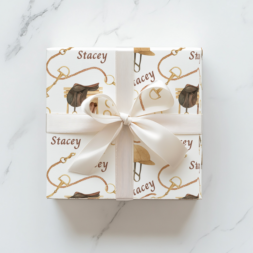 Personalized equestrian wrapping paper featuring watercolor saddles, boots, and bridles, printed on satin-finish paper from Trésor Valeur’s Modern Equestrian Collection
