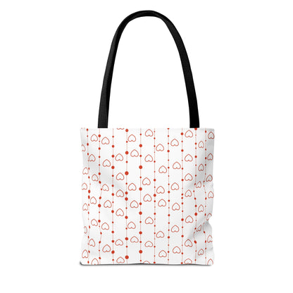 Tote bag with red heart pattern on a white background