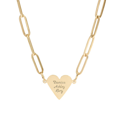 Gold heart-shaped pendant necklace with engraved names on a white background