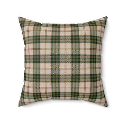 Plaid pillow with green and beige pattern on a white background