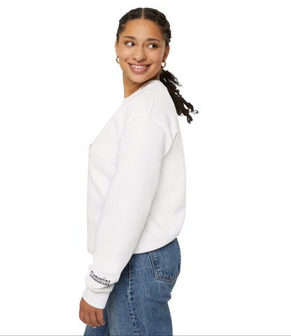 Woman wearing a white sweatshirt with text on sleeves and blue jeans against a white background