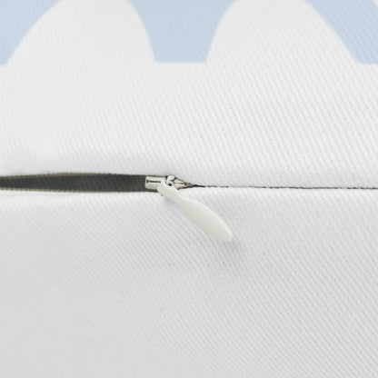 Close-up of a white jacket with a zipper on a light blue background