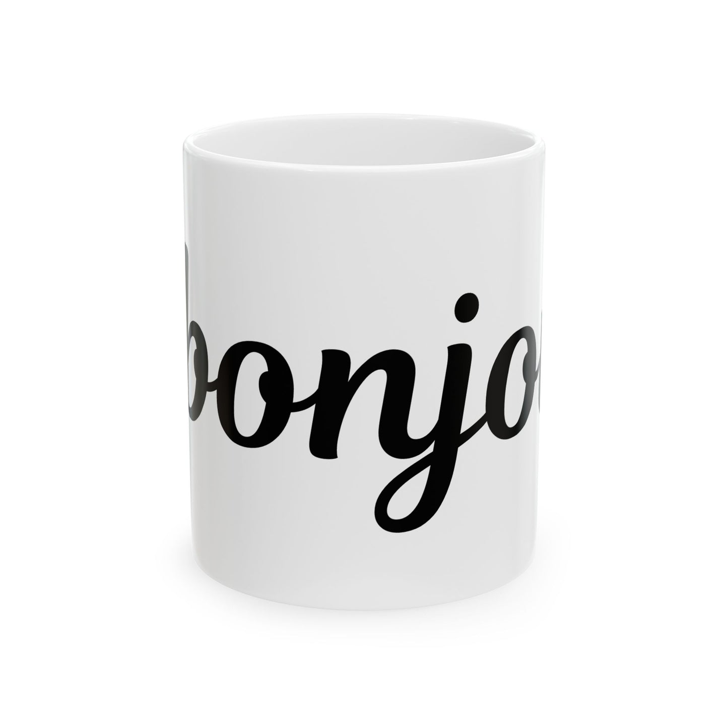White mug with 'bonjour' black text on a white background