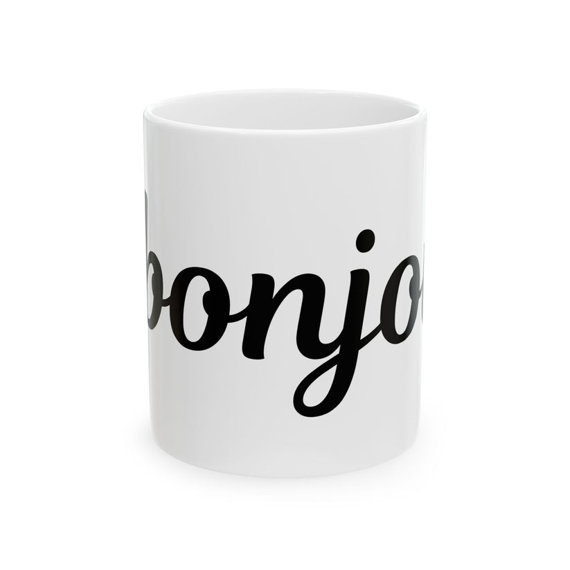 White mug with 'bonjour' black text on a white background