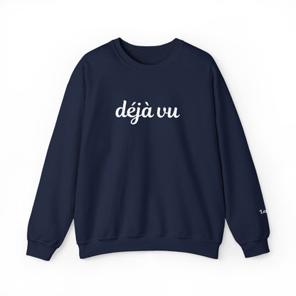 Navy blue sweatshirt with white embroidered "deja vu" on a white background