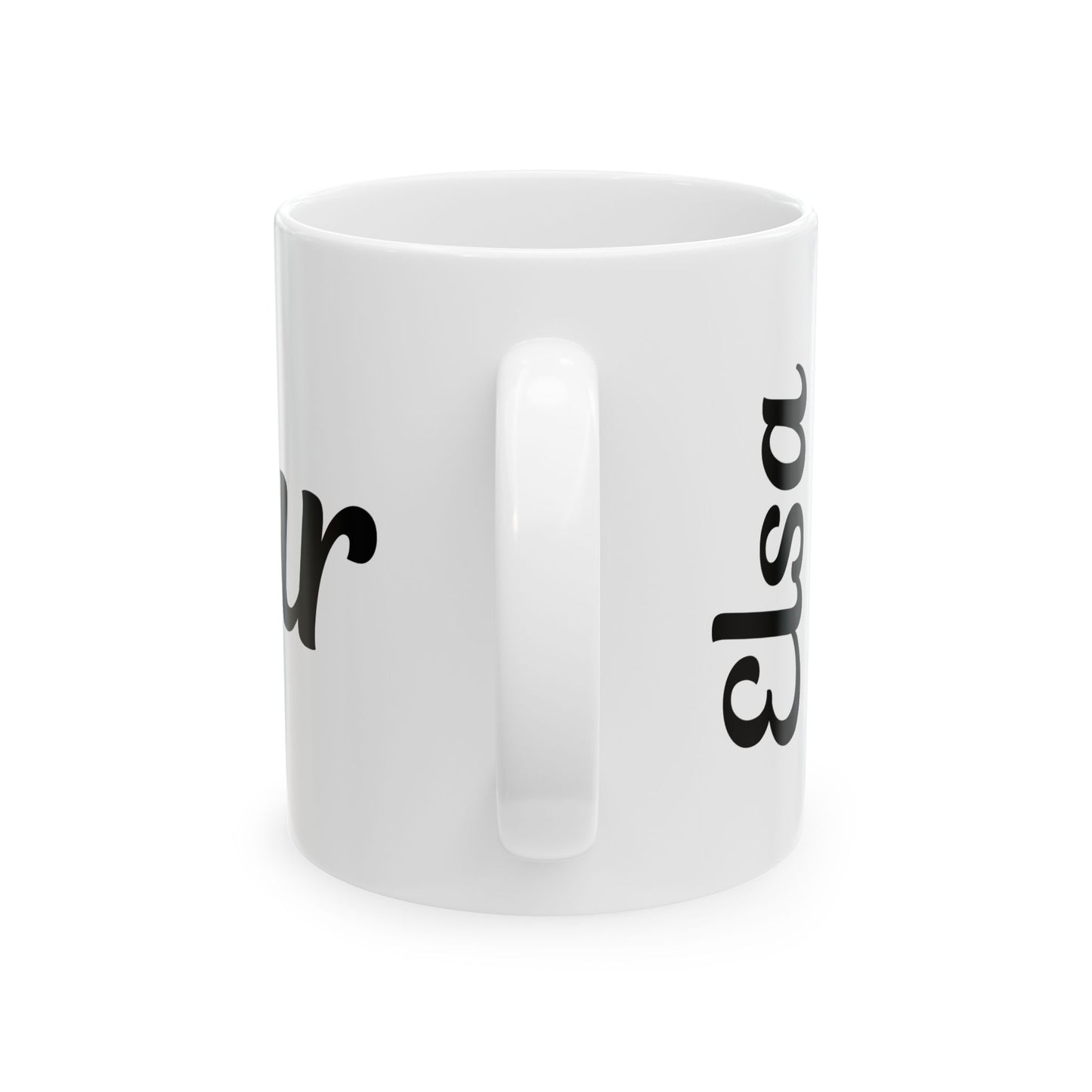 White mug with black bonjour and Elsa 
text on a white background