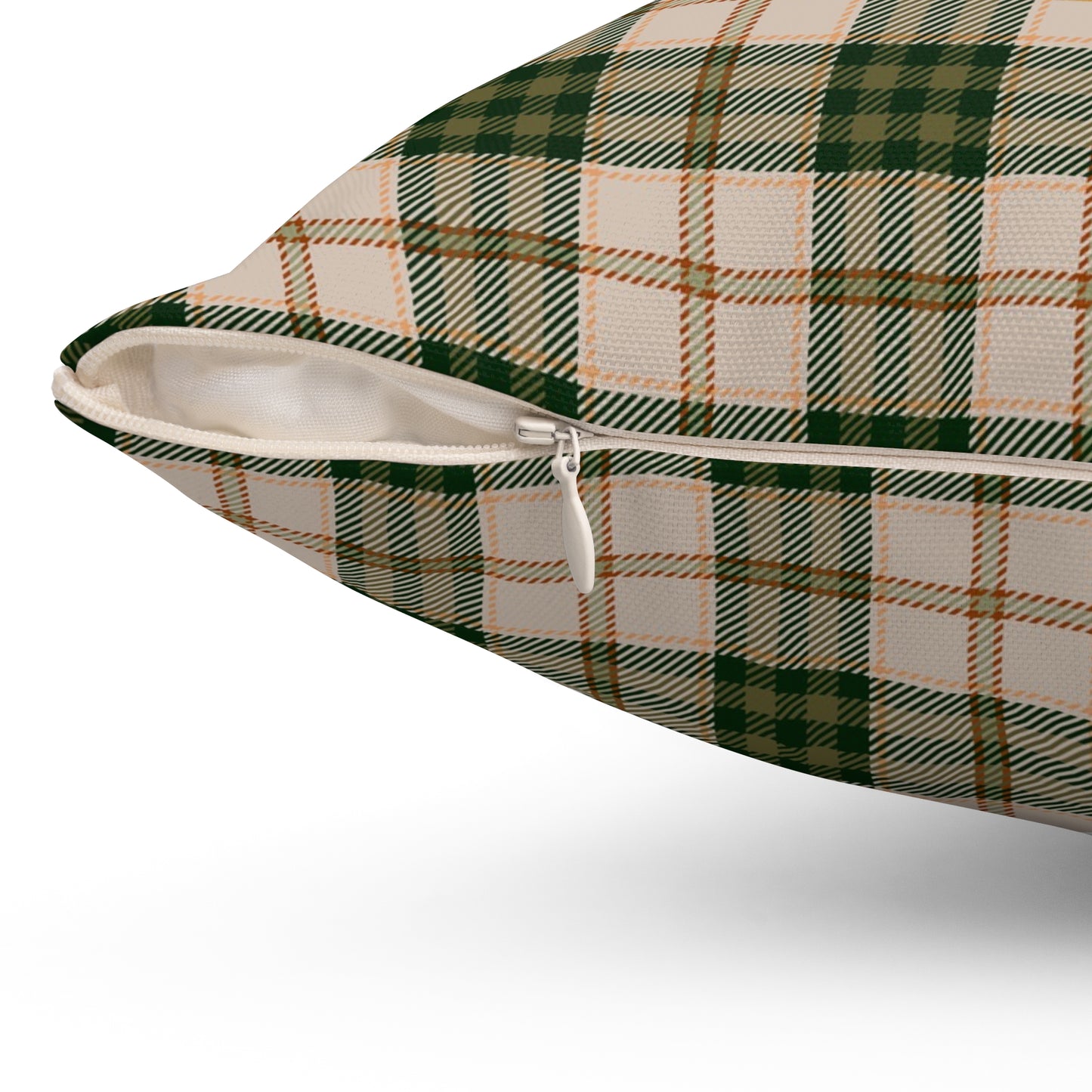 Plaid patterned pillow with a zipper on a white background