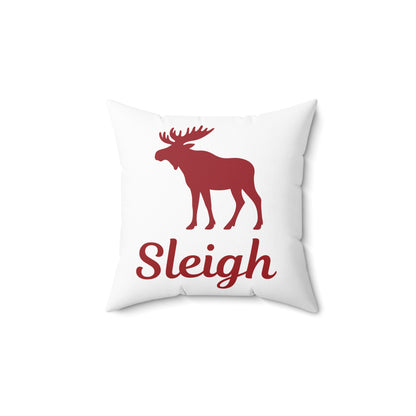 White pillow with red moose and 'Sleigh' text on a white background