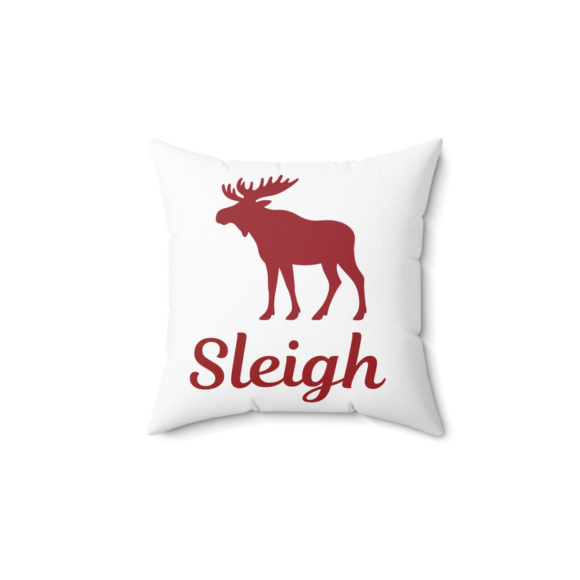 White pillow with red moose and 'Sleigh' text on a white background