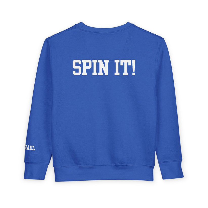 Blue sweatshirt with 'SPIN IT!' text on a white background