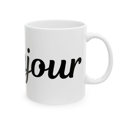 White mug with 'bonjour' text on a white background