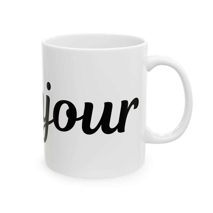 White mug with 'bonjour' text on a white background