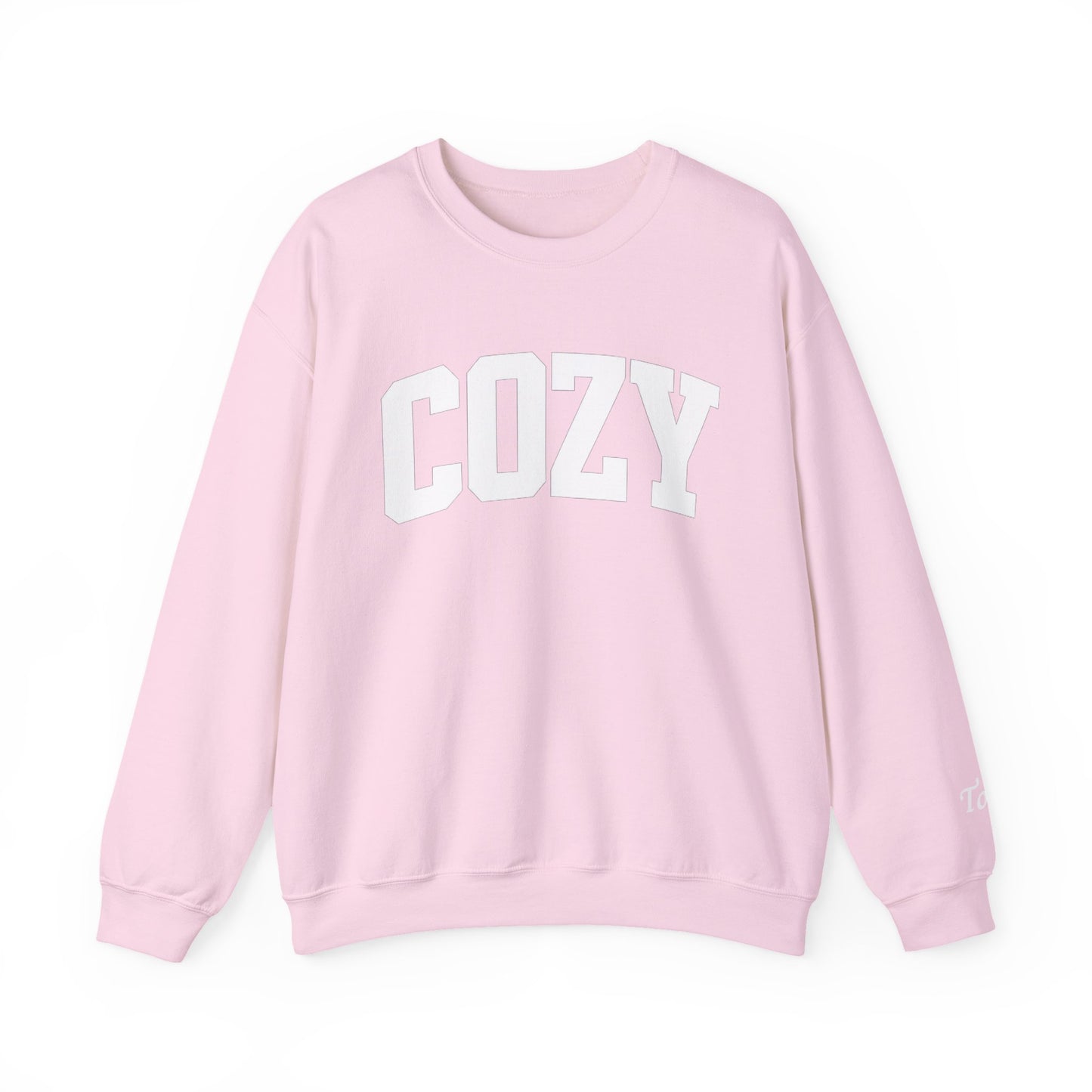 Pink sweatshirt with 'COZY' text on a white background