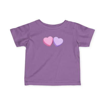 Purple t-shirt with two colorful hearts on a white background