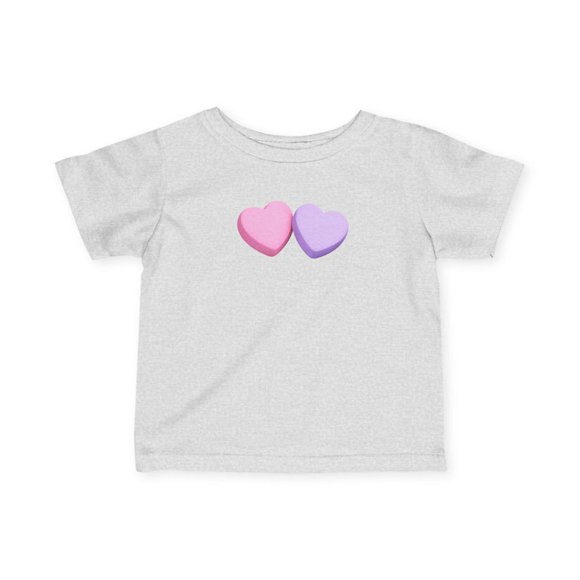 Gray t-shirt with two colorful heart-shaped candy designs on a white background