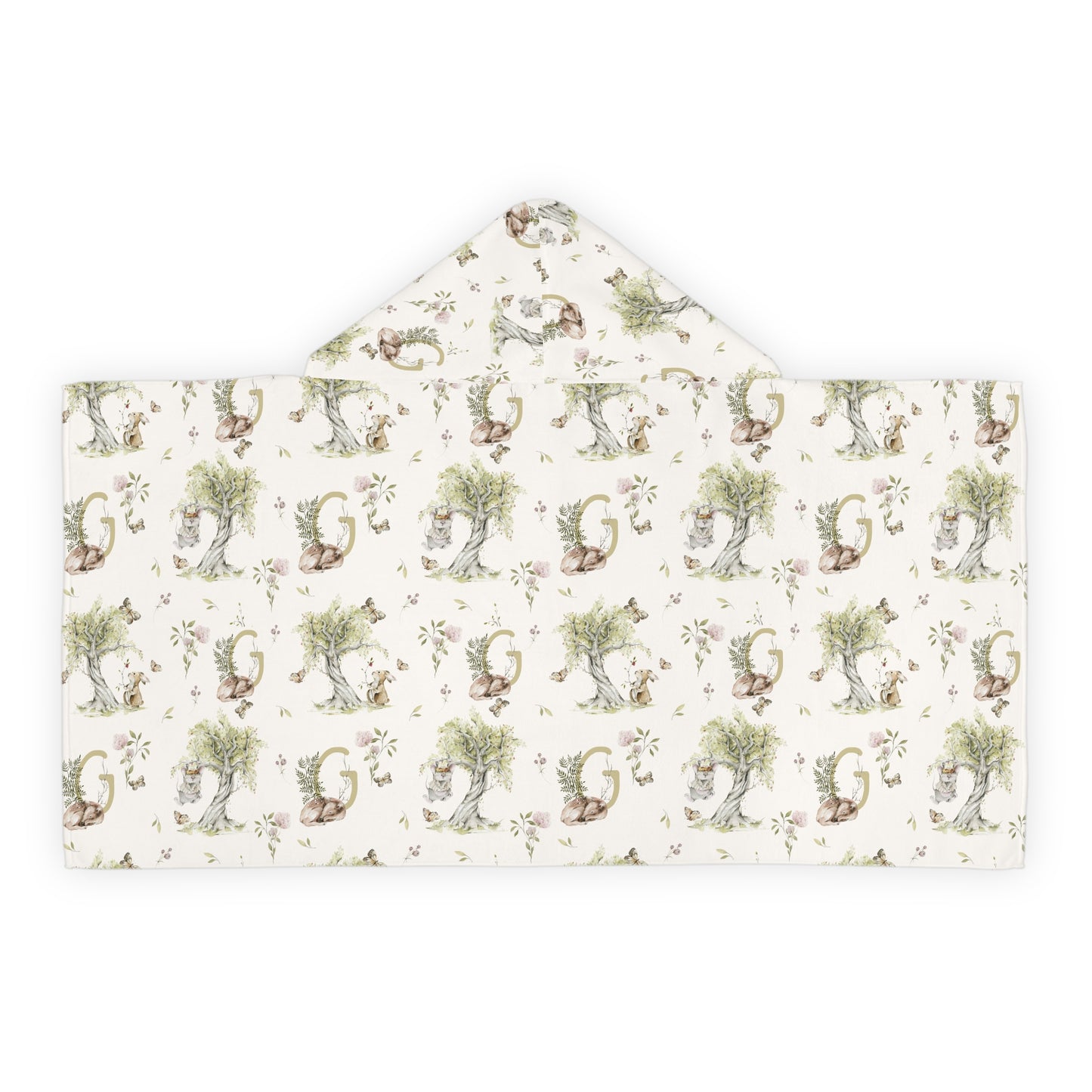 Patterned hooded towel with watercolor mice and bunnies and a monogrammed initial in a bathroom