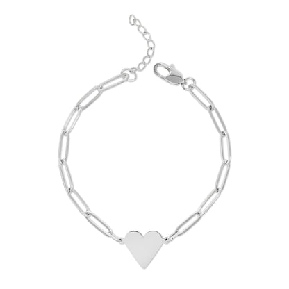 Silver bracelet with a heart charm on a white background