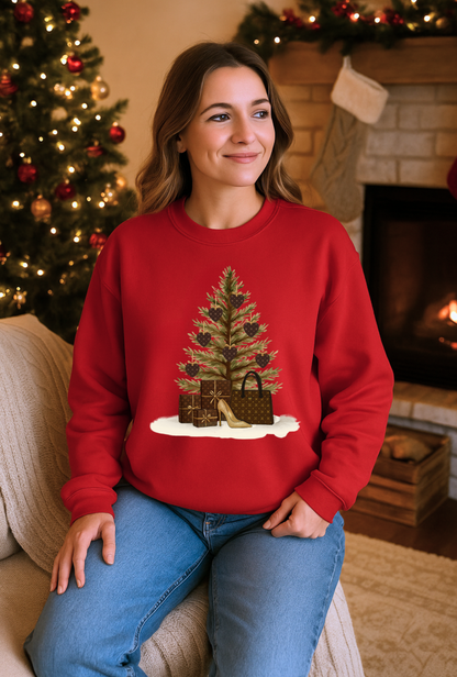 Woman wearing a red sweater with a Christmas tree design, sitting in a cozy living room.