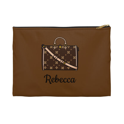 Brown pouch with a embroidered handbag design and the name 'Rebecca' on a white background