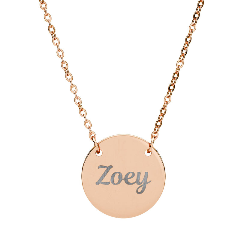 Rose gold necklace with a round pendant engraved with 'Zoey' on a white background