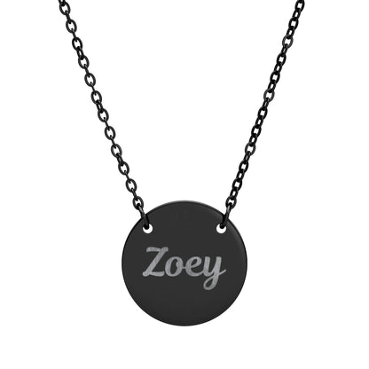 Black necklace with a round pendant engraved with 'Zoey' on a white background