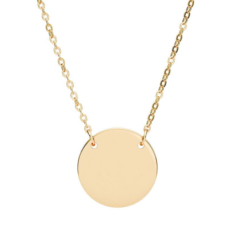 Gold necklace with a round pendant on a white background