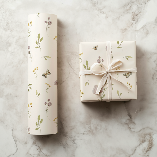 Petits Animaux floral-patterned gift wrap and wrapped gift on a marble surface
