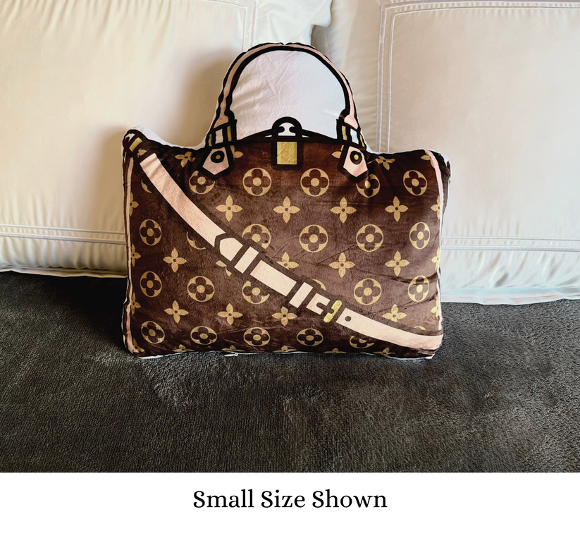 Classic handbag with handle shaped pillow.