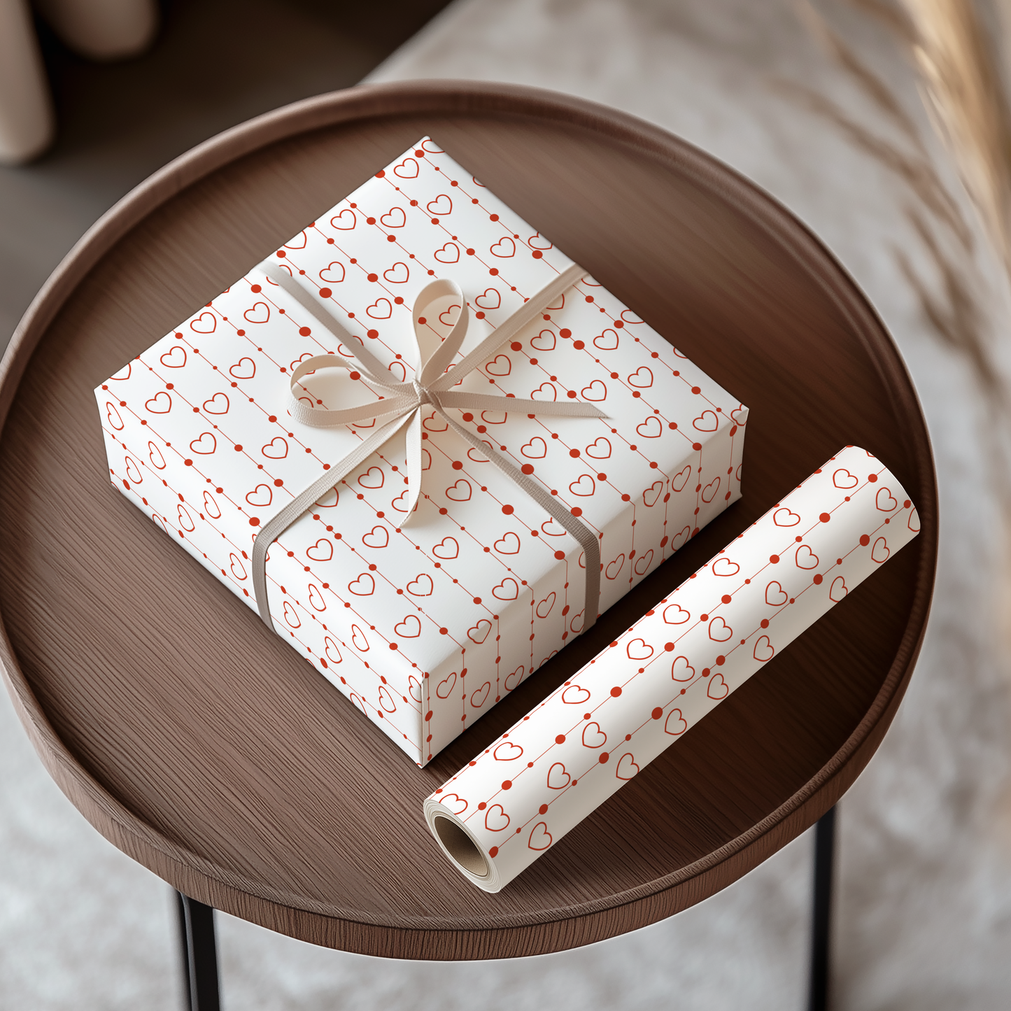 Gift box with heart pattern and bow on a wooden tray