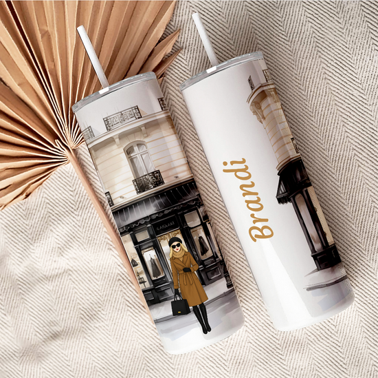Two tumblers with a boutique design showing the full wrap.  Personalized with an avatar and name.