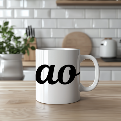 White mug with 'ciao' printed on it in a kitchen setting